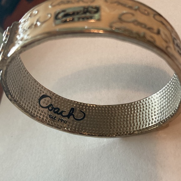 Coach Silvertone and Off-White Enamel Bangle Bracelet - Picture 2 of 9